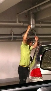 Car lockout services by Eagle's emergency locksmith Our emergency locksmith is unlocking a car door