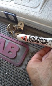I'm spraying a little bit graphite for the new sliding door lock to work smoother.