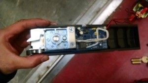 Here is the inside of the alarm panic mechanism lock right after I tested the wires and tightened the screws.