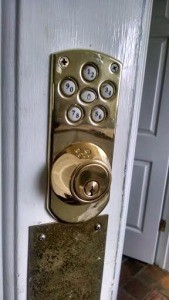 This is the Electronic keypad deadbolt lock after the installation on the garage door.